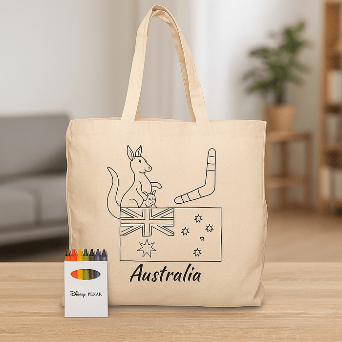 Squiggle Calico bag + Crayon set - A beige tote bag featuring an illustration of a kangaroo and Australian symbols, accompanied by a crayon set.