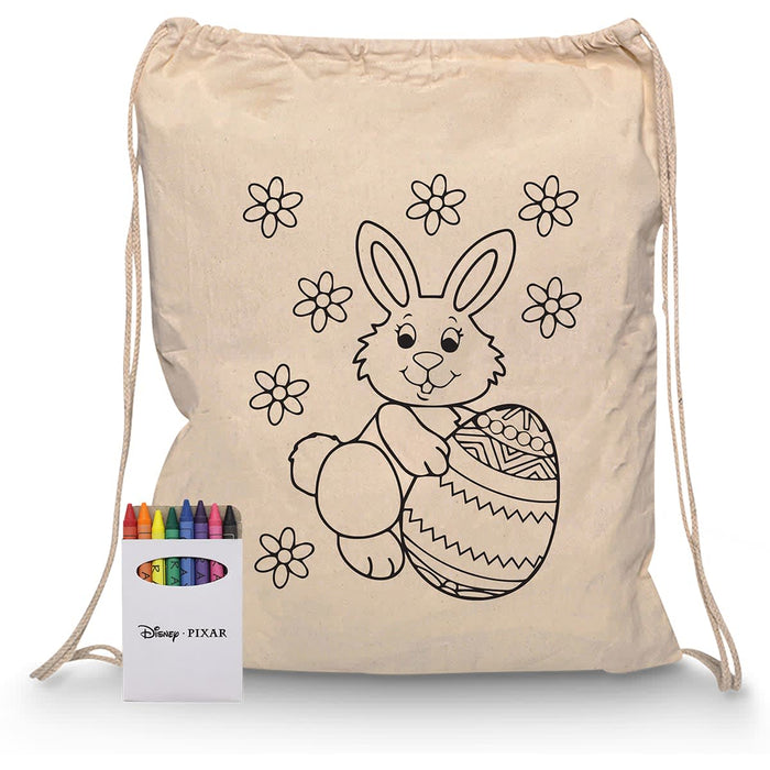 Squiggle Calico Drawstring Bag + Crayon set - A cream drawstring bag featuring a bunny design, accompanied by a crayon set in various colours.