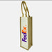 Jute Single Wine Bag - A jute wine bag in natural brown with a white panel and a distinctive logo. It features two sturdy handles.