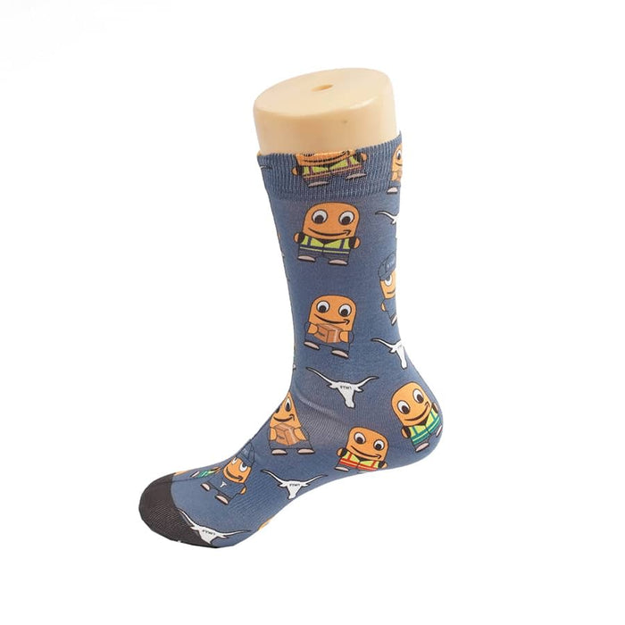 Magic Dress Socks - Colourful sock design featuring cartoon characters, predominantly in blue with orange, green, and yellow accents.