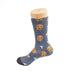 Magic Dress Socks - Colourful sock design featuring cartoon characters, predominantly in blue with orange, green, and yellow accents.