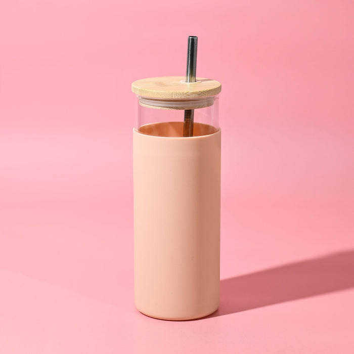 Sunrise Smoothie 500mL Tumbler - A drink bottle featuring a transparent upper section and a peachy pink outer sleeve, complete with a wooden lid and a metal straw.