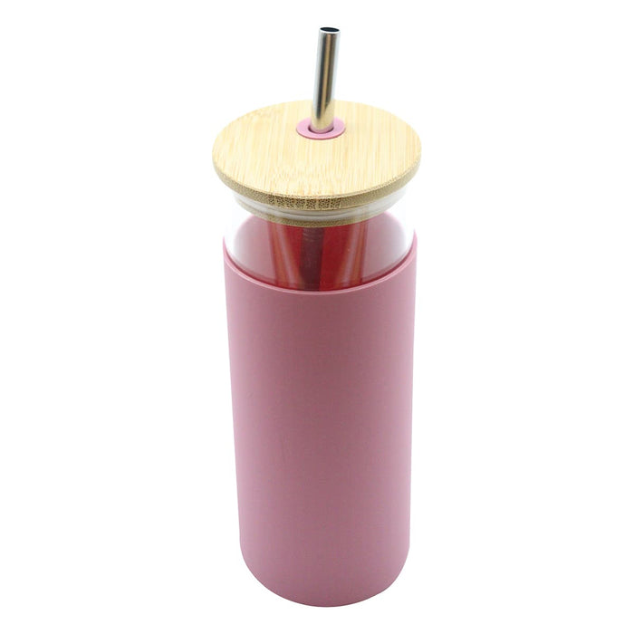 Sunrise Smoothie 500mL Tumbler - A drink bottle in a soft pink colour with a bamboo lid and metal straw, featuring a clear body.