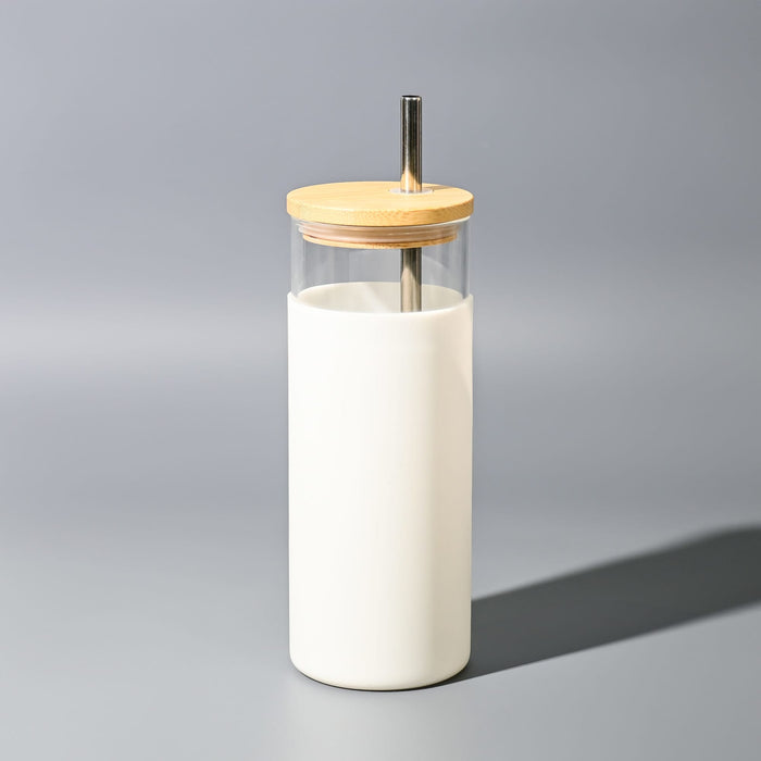 Sunrise Smoothie 500mL Tumbler - A drink bottle featuring a clear container with a white exterior and a wooden lid, complete with a metal straw.