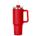 The Hippo 1.2L Mug - A drink bottle in vibrant red with a clear lid and straw, featuring a sturdy handle and a sleek design.