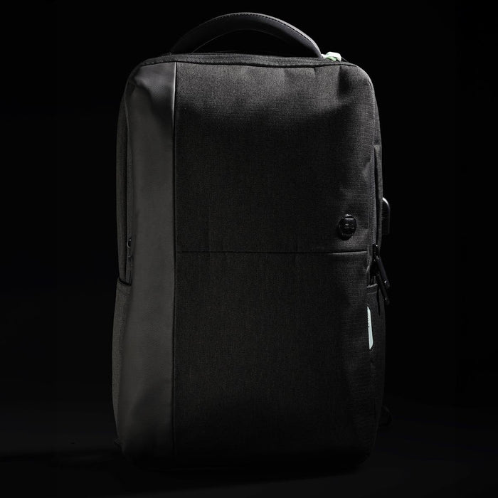 Swissdigital Arosa Backpack - A sleek black backpack with a textured finish and a subtle logo, featuring zippered compartments and a sturdy handle.