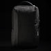 Swissdigital Arosa Backpack - A sleek black backpack with a textured finish and a subtle logo, featuring zippered compartments and a sturdy handle.