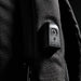 Swissdigital Arosa Backpack - A black backpack with a textured surface and a small logo integrated into the design.