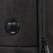 Swissdigital Arosa Backpack - A black backpack featuring a textured surface and a round logo. The zipper detail is also visible.