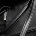 Swissdigital Arosa Tote Bag - A black tote bag featuring a smooth, sleek handle and a subtle logo. The fabric has a textured finish.