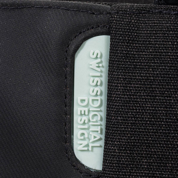 Swissdigital Arosa Tote Bag - A black tote bag featuring a light blue branding label, made with a durable fabric.