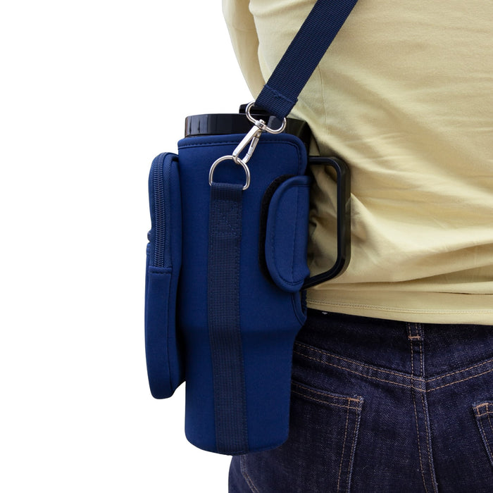 Aero Neoprene Bottle Carrier - A drink bottle carrier in navy blue, featuring a strap and additional storage pockets. It has a logo on the side.
