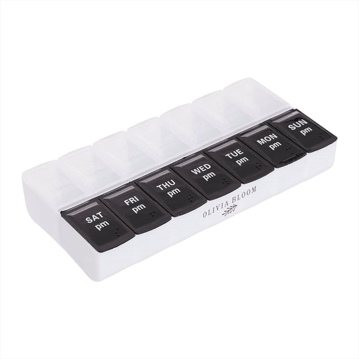 Recycled AM/PM Pill Case - A white and black AM/PM pill case with compartments for each day of the week. Features a logo on the base.