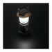Mini Camping Lantern - A mini camping lantern in grey and black with a transparent light dome and a handle on top.