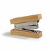 Bamboo Stapler - A bamboo stapler with a silver metal mechanism, featuring a natural wood finish.