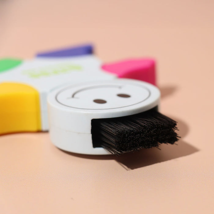 Little Guy Highlighter - A highlighter in the shape of a star, featuring pink, yellow, green, and blue tips, with a smiley face on the body.