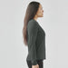 Women's Settebello L/S Tee - A long-sleeve women's t-shirt in dark green, displayed from the side with a fitted silhouette.