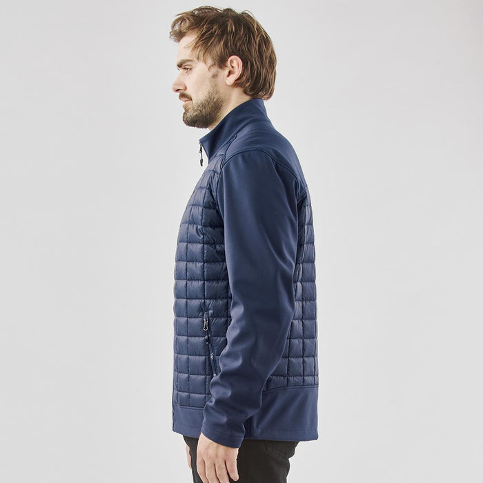 Men's Appalachian Thermal Softshell Jacket - A navy blue softshell jacket with quilted design and zip pockets, featuring a logo on the chest.