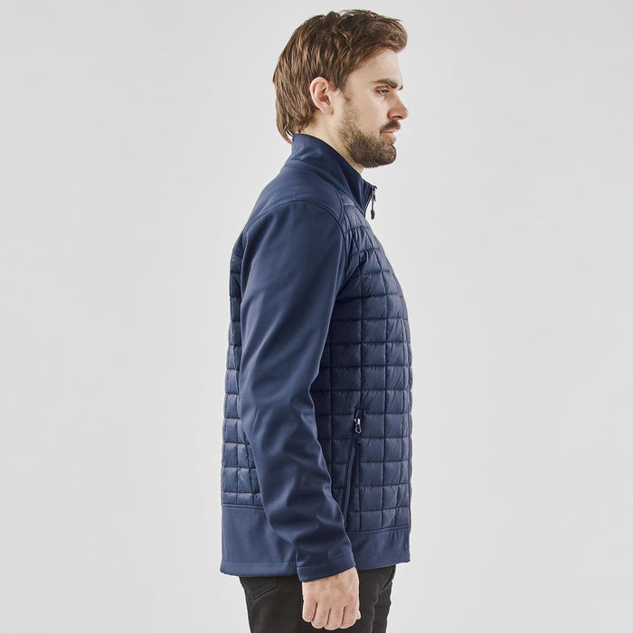 Men's Appalachian Thermal Softshell Jacket - Men's thermal softshell jacket in navy, featuring a quilted design and a zipped pocket, with a branding logo.