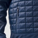 Men's Appalachian Thermal Softshell Jacket - A navy thermal softshell jacket featuring a quilted texture and a zippered pocket on the side.