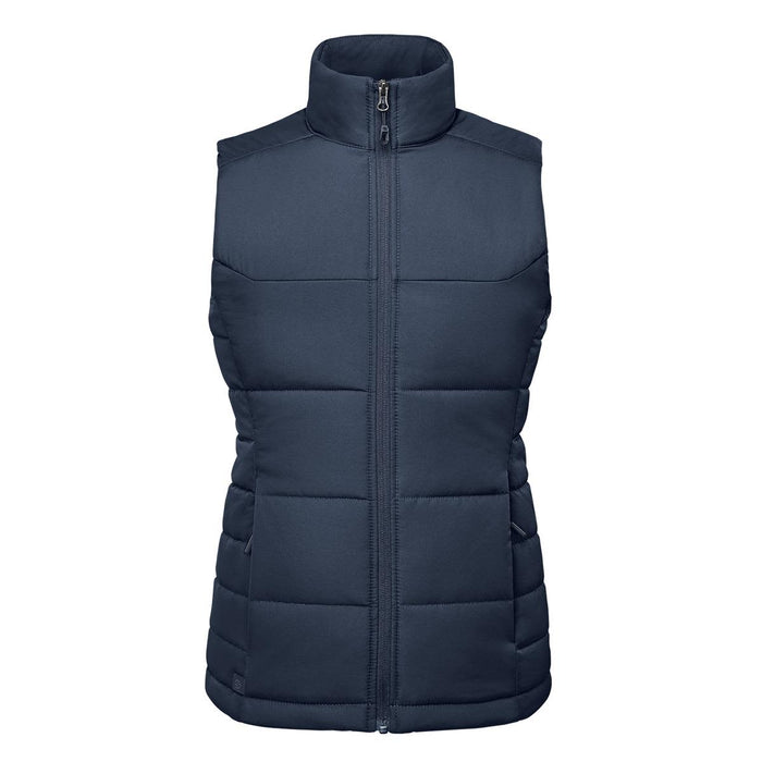 Women's Sierra Thermal Vest - A navy women's thermal vest with a zip front, featuring a high collar and padded design. It has a branding logo.