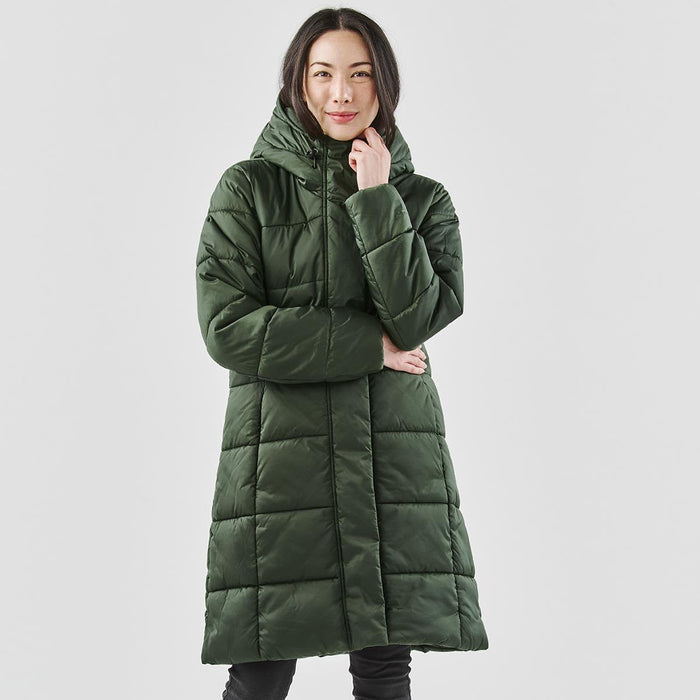 Women's Elkridge Parka - A long, green puffer jacket featuring a hood and a quilted design, presented on a model.
