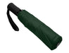 Como Fold-Up Umbrella - A green Como Fold-Up Umbrella, neatly folded with a black handle and strap. It features a logo on the surface.
