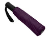 Como Fold-Up Umbrella - A purple fold-up umbrella with a black handle and a strap. It features a compact design for easy storage.