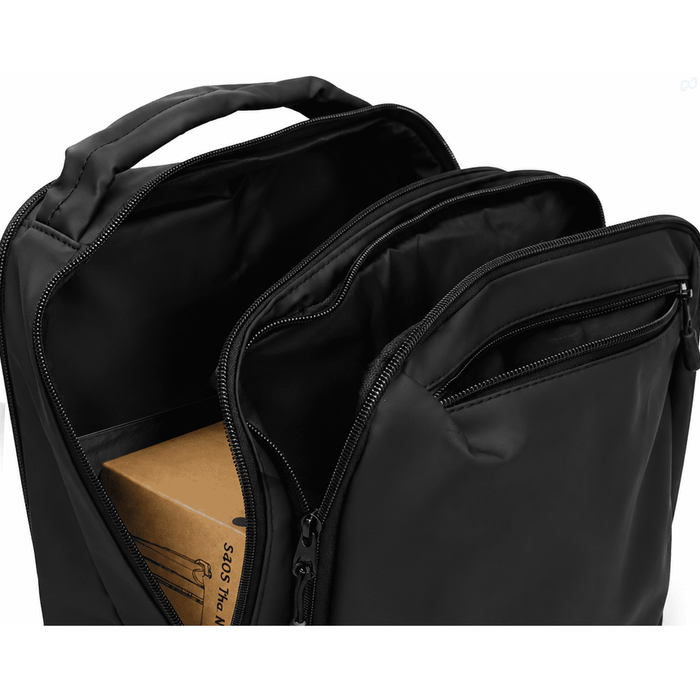 Tessa Soft PU Backpack - A black soft PU backpack with multiple zippered compartments and a visible interior box.
