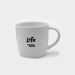 The Maxwell 330ml Ceramic Mug - A white ceramic mug with a handle and a logo printed on the side.