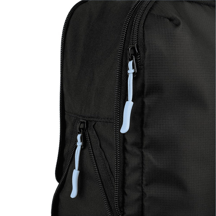 Wander & Roam Compression Packing Cube Set - A black packing cube with blue zipper pulls, showcasing a close-up of the zippered compartment.