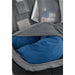 Wander & Roam Travel Backpack - A travel backpack in grey with a blue neck pillow visible in an inner compartment, along with other items.